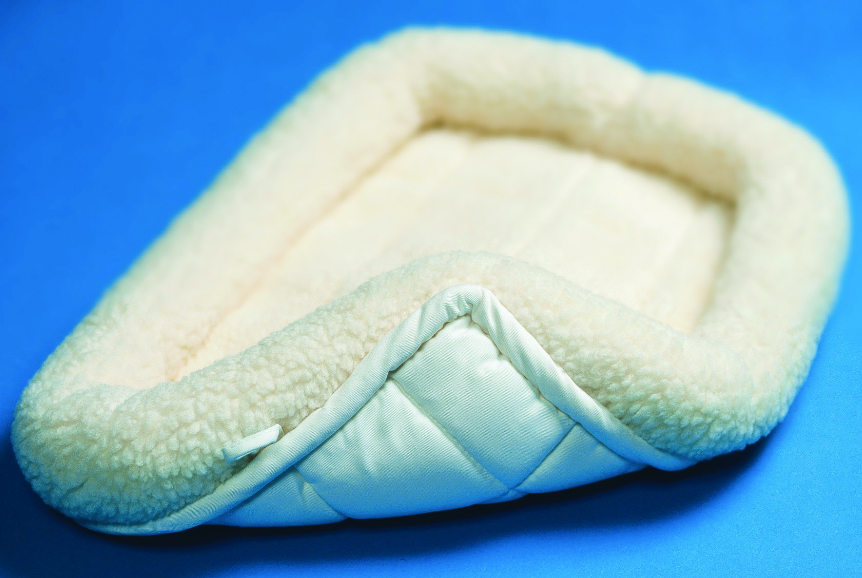 Quiet Time Sheepskin Bed - 22" X 13"